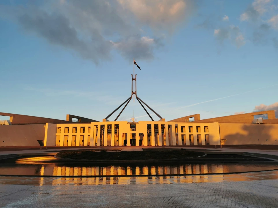 A large building with a flag on top of it
